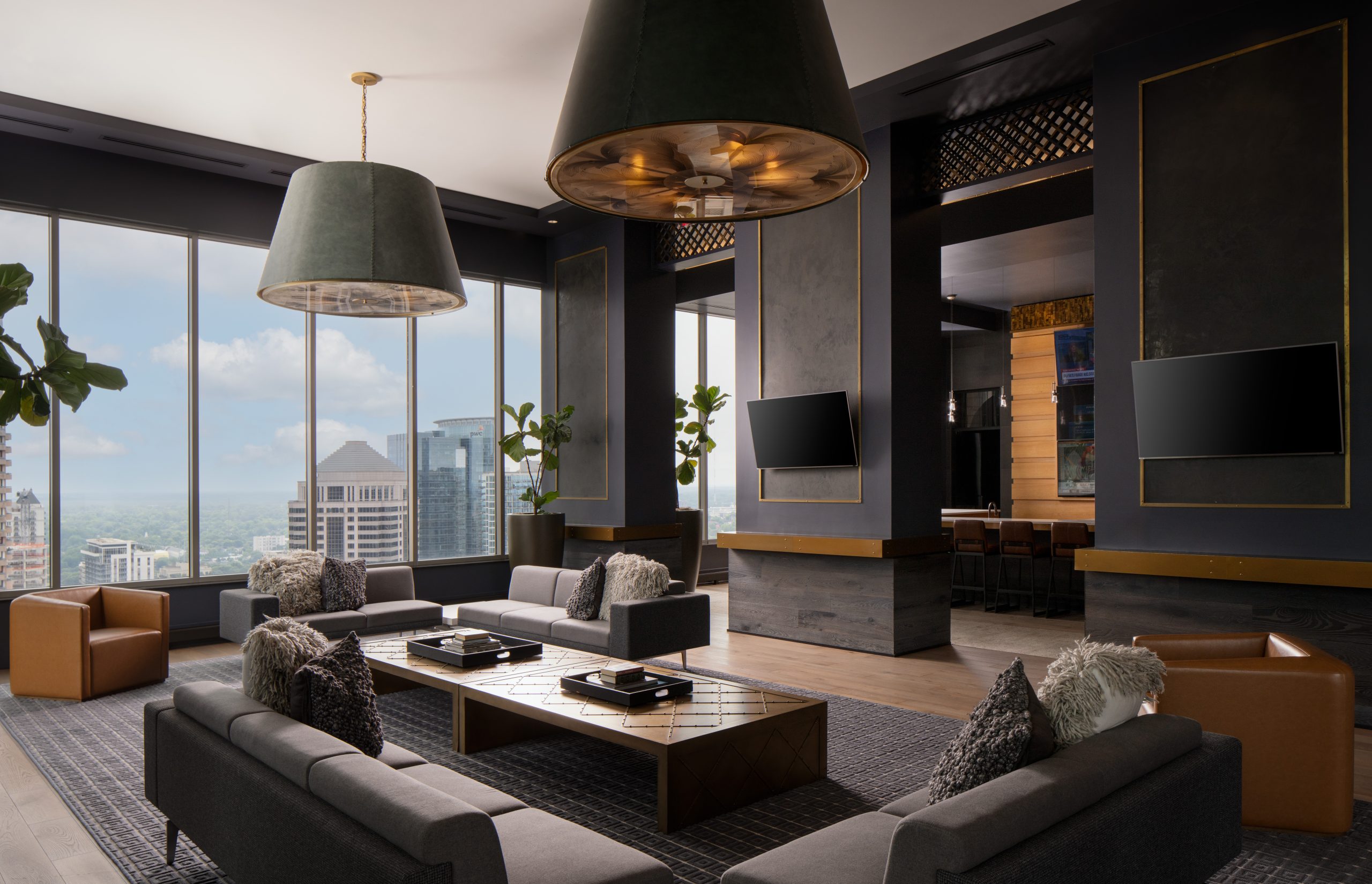 Hue Midtown apartments club room with floor to ceiling windows with views of Atlanta, GA