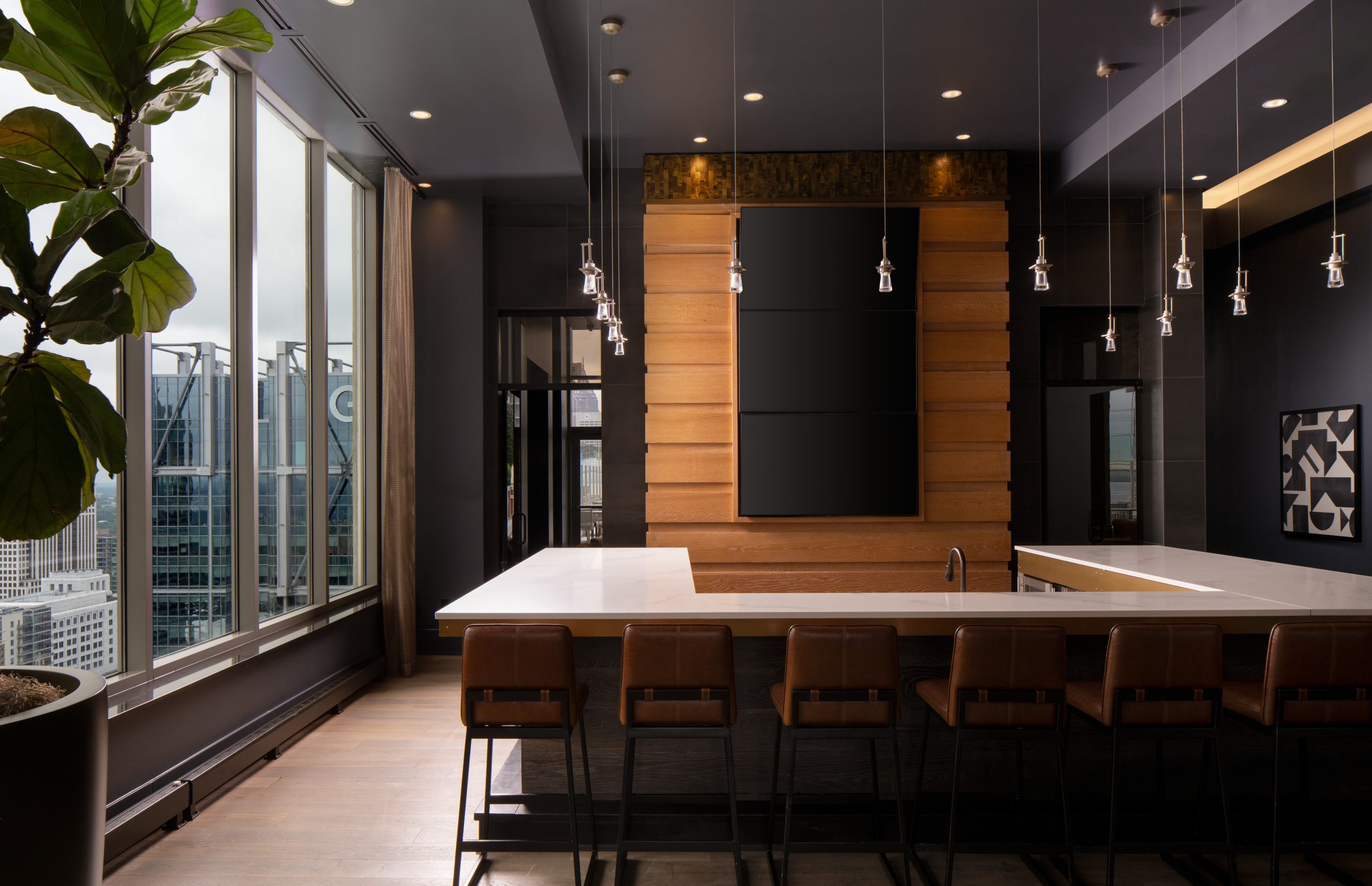 Sky-rise club room bar in The Hue Midtown luxury apartments in Atlanta, GA