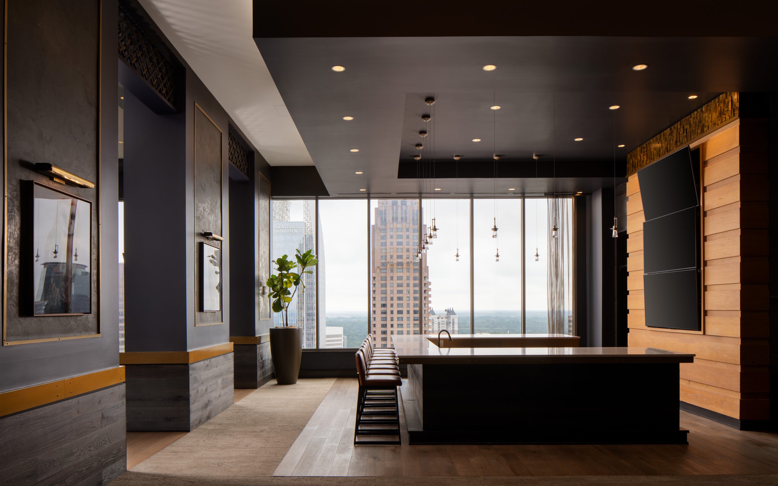 Sky-rise club room bar in The Hue Midtown luxury apartments in Atlanta, GA